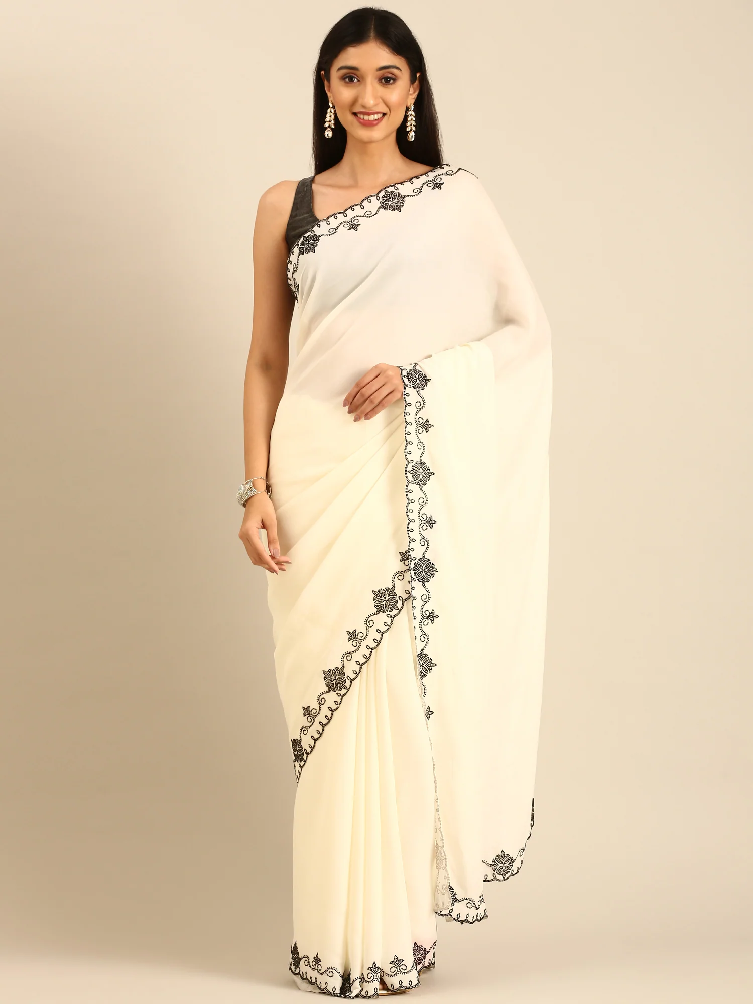 Cream satin saree with Swarovski embroidered border