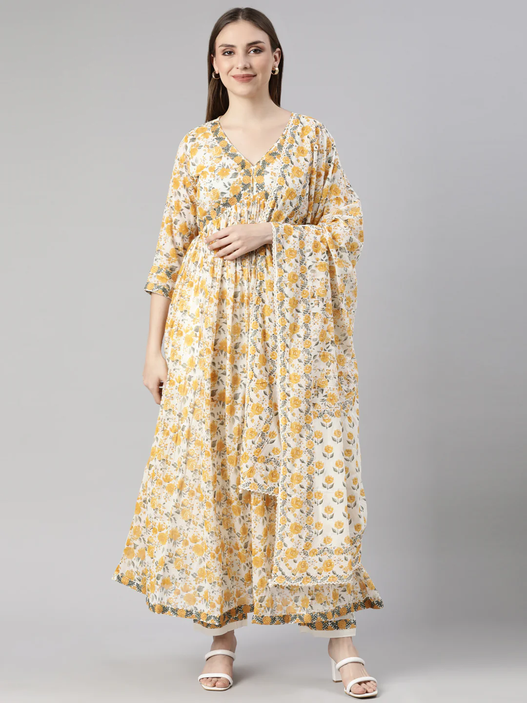 Neerus Mustard Pleated Flared Floral Kurta And Trousers With Dupatta