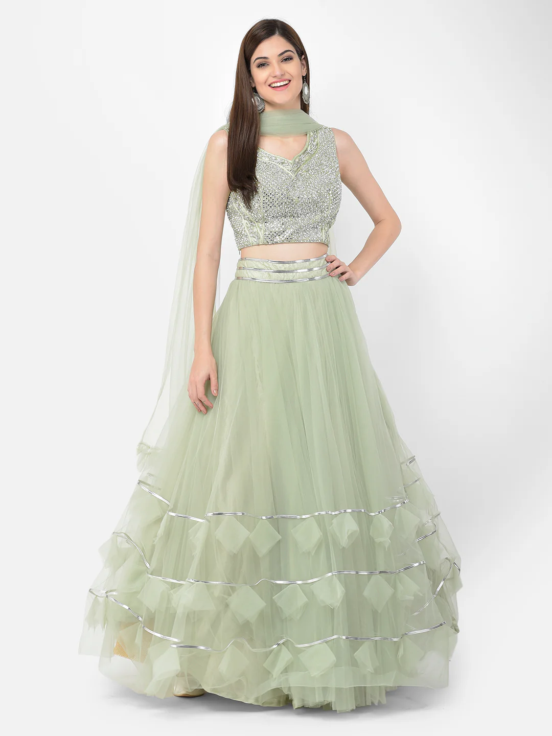 Neerus Pista Color Nett Fabric Lehenga Choli